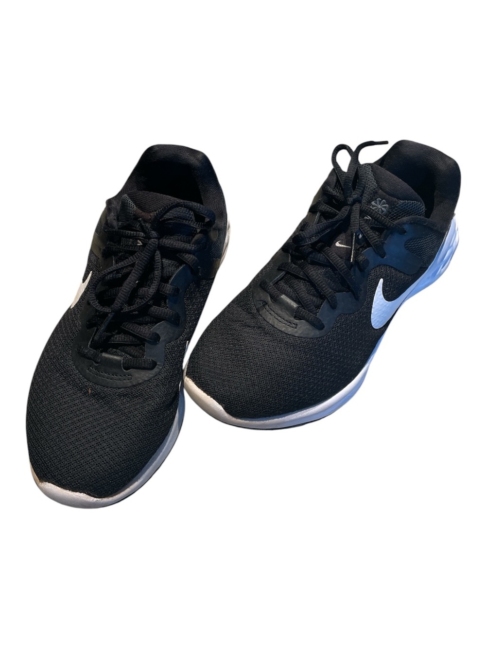 Nike women’s Black Sneakers with White Swoosh